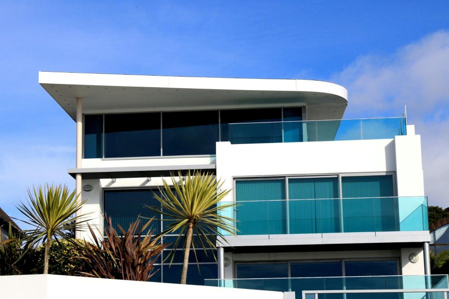 Beautiful modern luxury home symbolizing real estate timing