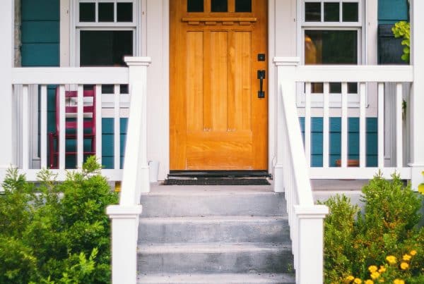 Charming house entrance with flowers.