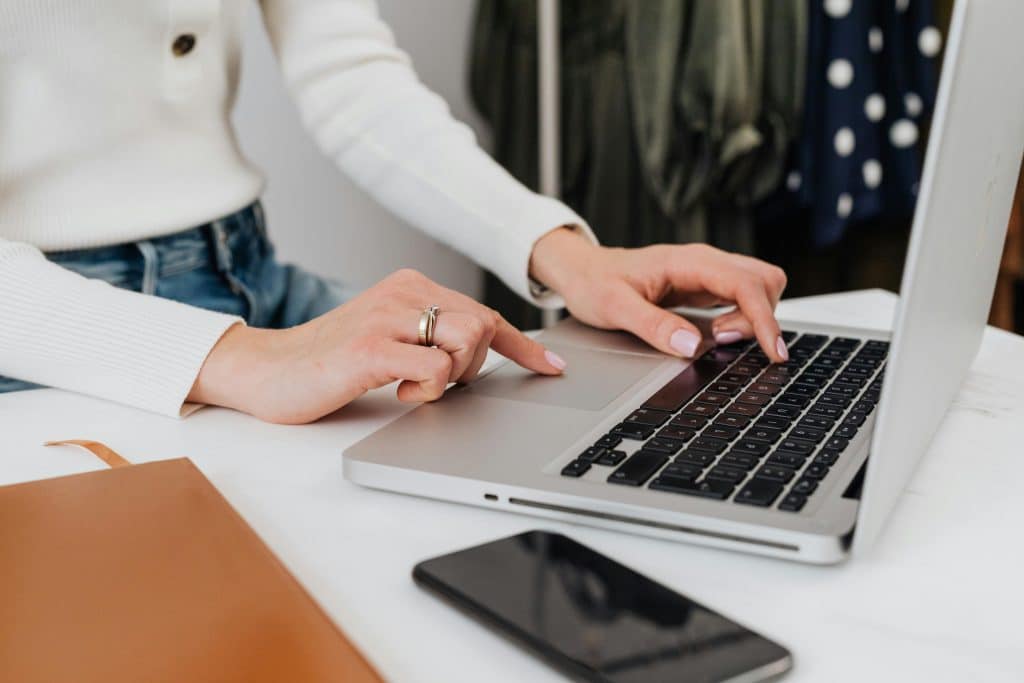Person using laptop at desk
