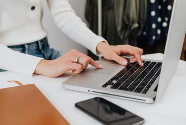 Person using laptop at desk
