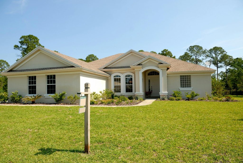 Single-story house with green lawn