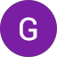 A purple circle with a white outline of the uppercase letter "G" in the center.